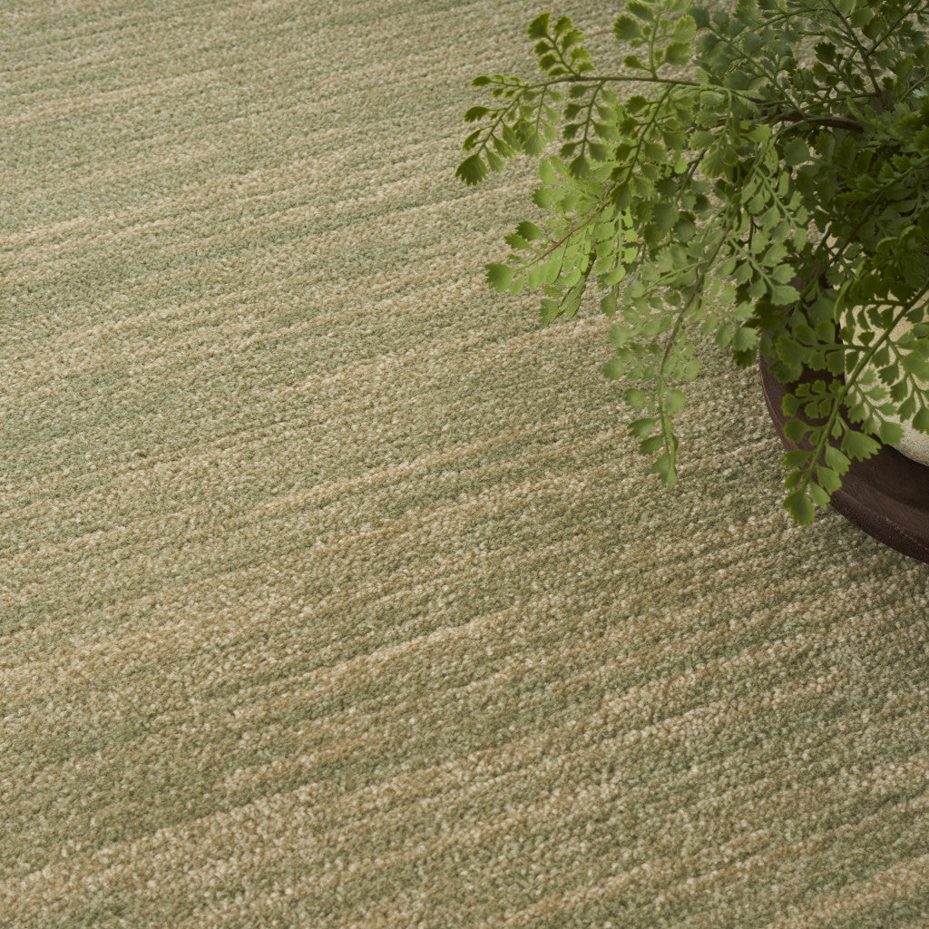 5' X 7' Green And Gold Abstract Indoor Outdoor Area Rug